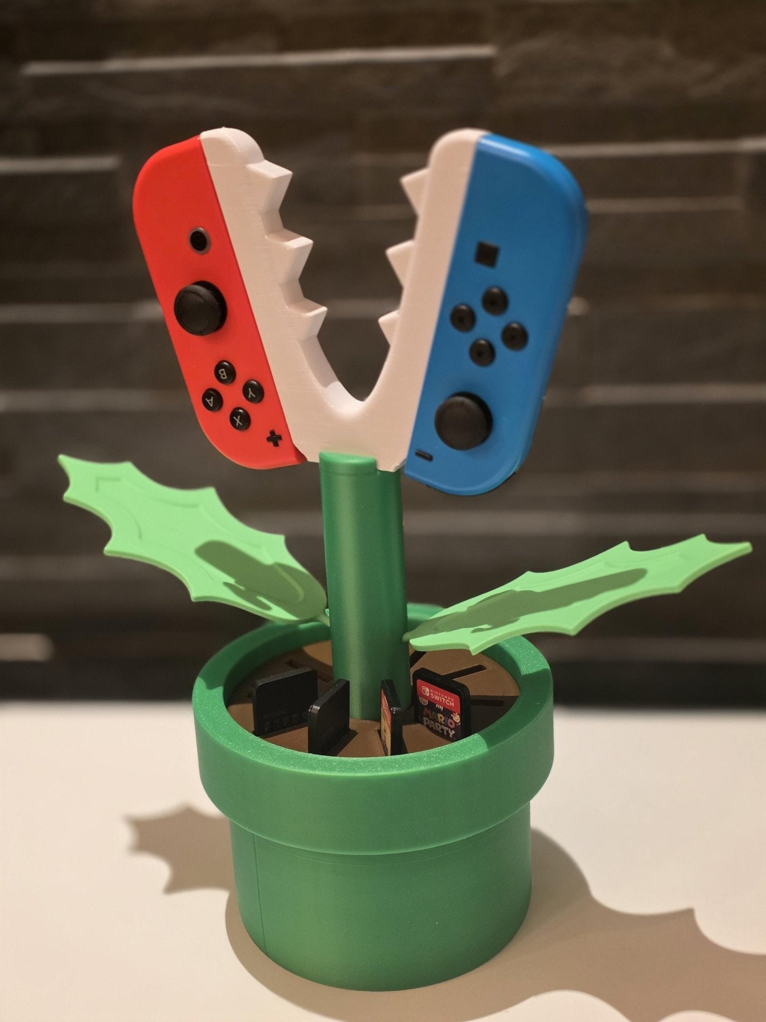 Switch Zubehör Organizer, JoyCons in Pflanzenständer, Geschenkidee für Gamer.